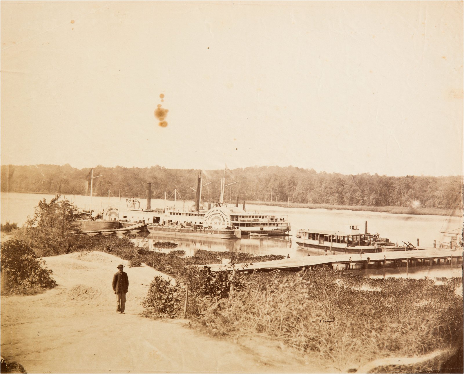 Historical photograph of the side-wheel steamer Planter, the Confederate transport vessel seized by Robert Smalls and his crew in 1862.